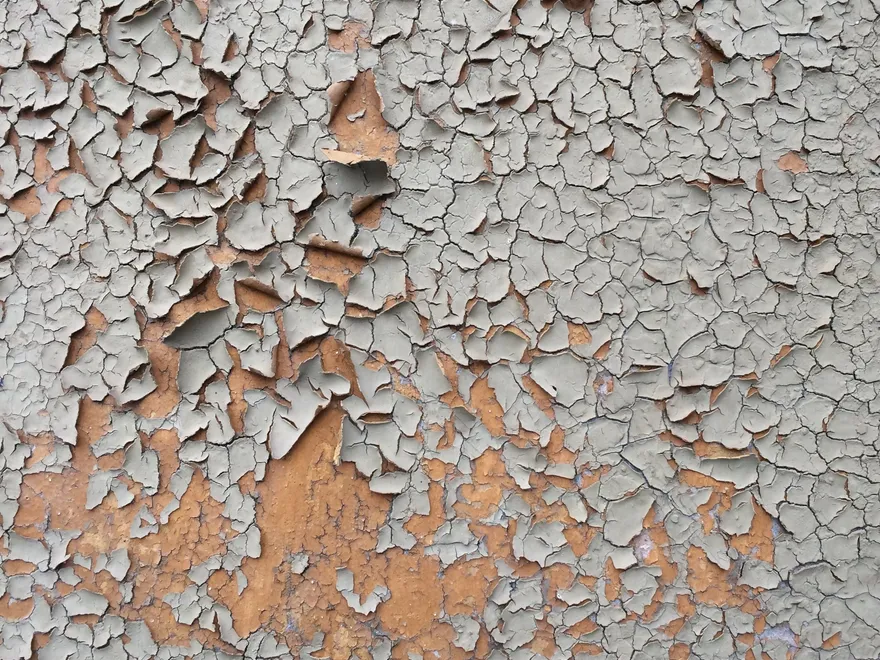 Ancienne peinture écaillée sur un mur